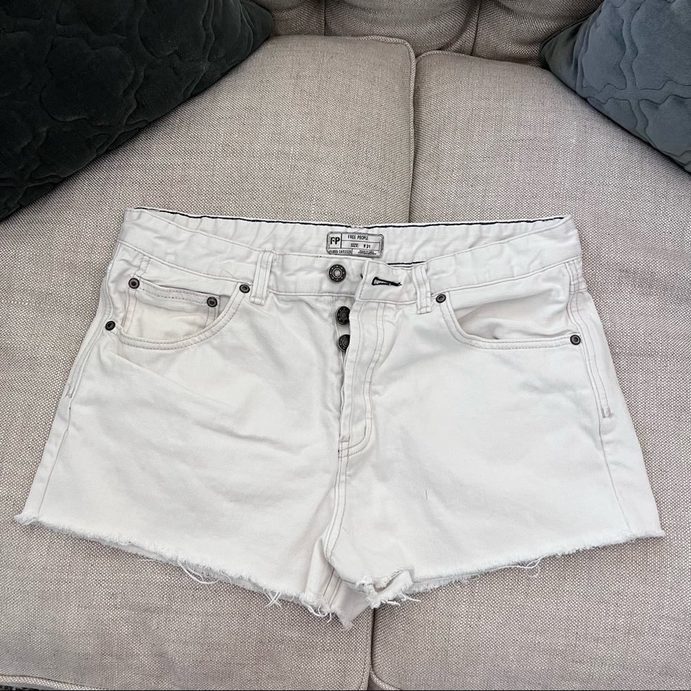 FREE PEOPLE high waisted denim button fly cut off shorts (size 31 off white)